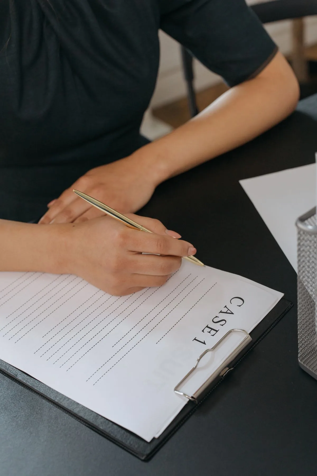 Person reviewing and signing off on job paperwork